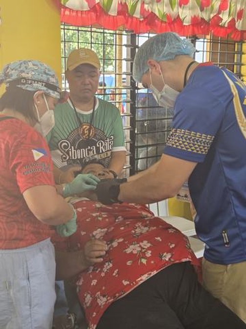 A photograph from an ARMS outreach.