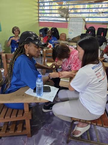 A photograph from an ARMS outreach.